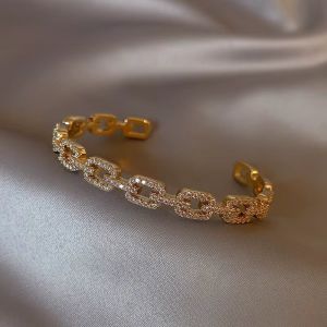 Bratara "Golden Wrist" placata cu aur