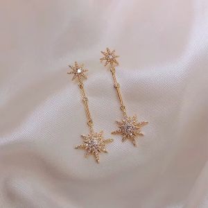 Cercei "Golden stars" placati cu aur si cristale