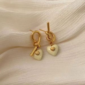 Cercei "Love Knot" placati cu aur