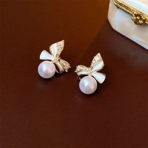 Cercei "Pretty Bows" placati cu aur