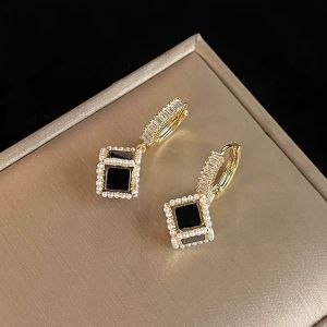Cercei "Cubic" placati cu aur