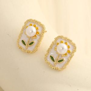 Cercei "Flower Frame" placati cu aur